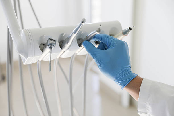 Professional Root Canal Treatment technician working in Ina, IL